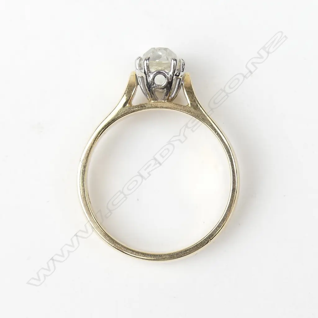 An 18ct gold and 1.50ct diamond solitaire ring Image 1++