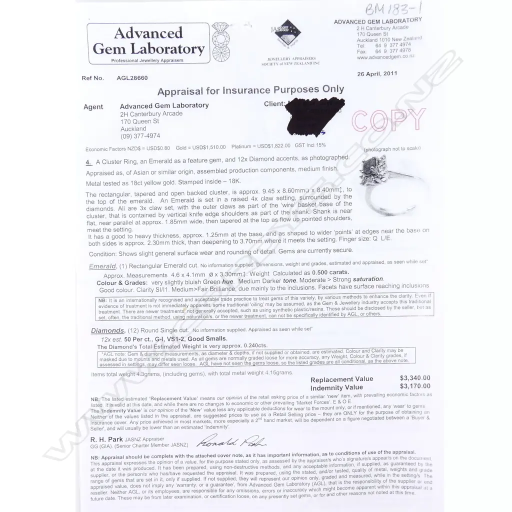 An 18ct gold emerald and diamond ring Image 1++