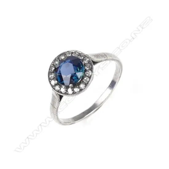A vintage silver natural sapphire and diamond ring