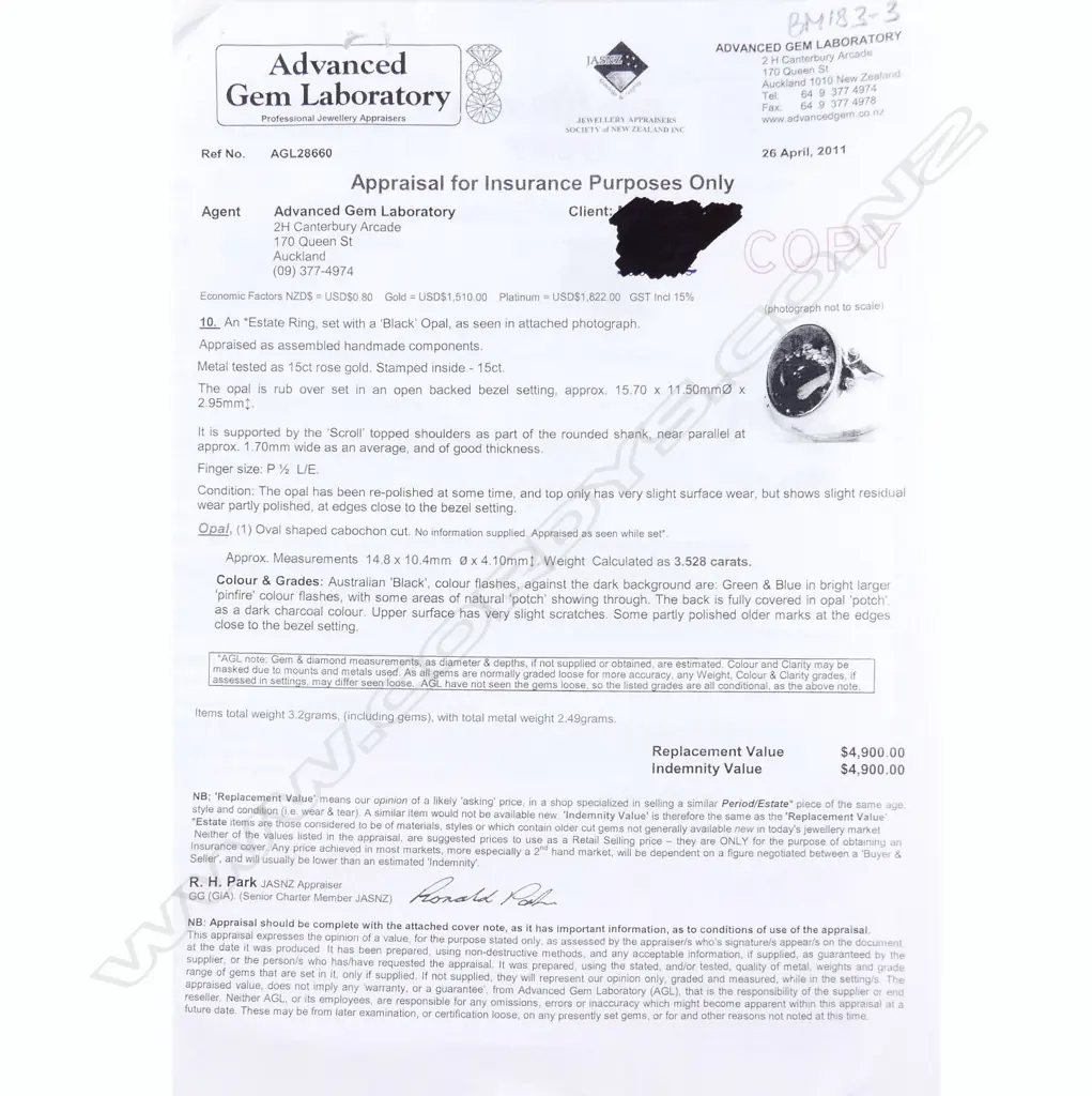 A 15ct rose gold and black opal ring Image 1++