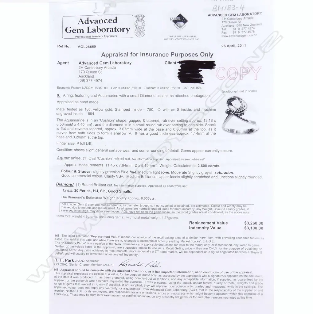 An 18ct gold aquamarine and diamond ring Image 1++