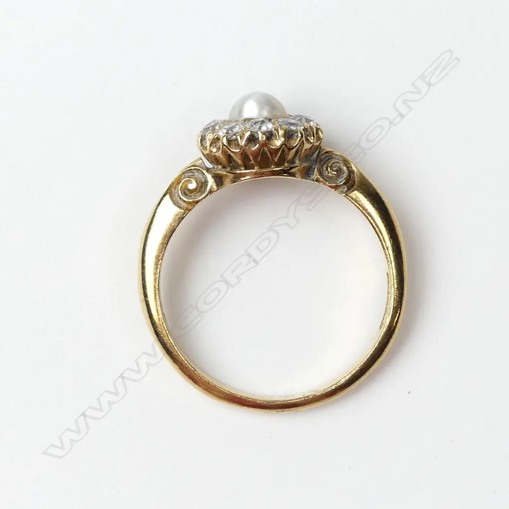An 18ct gold pearl and diamond ring Image 1++