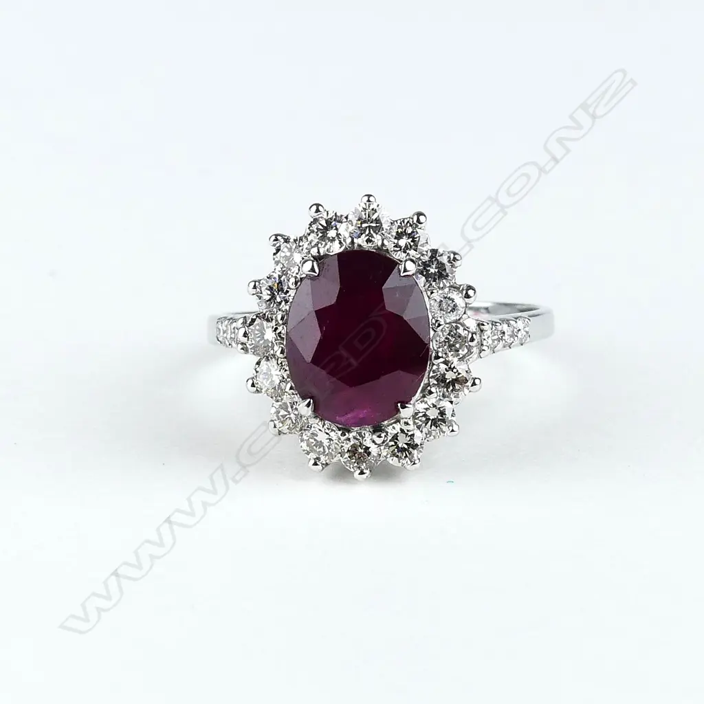 A 9ct white gold ruby and diamond ring Image 1++