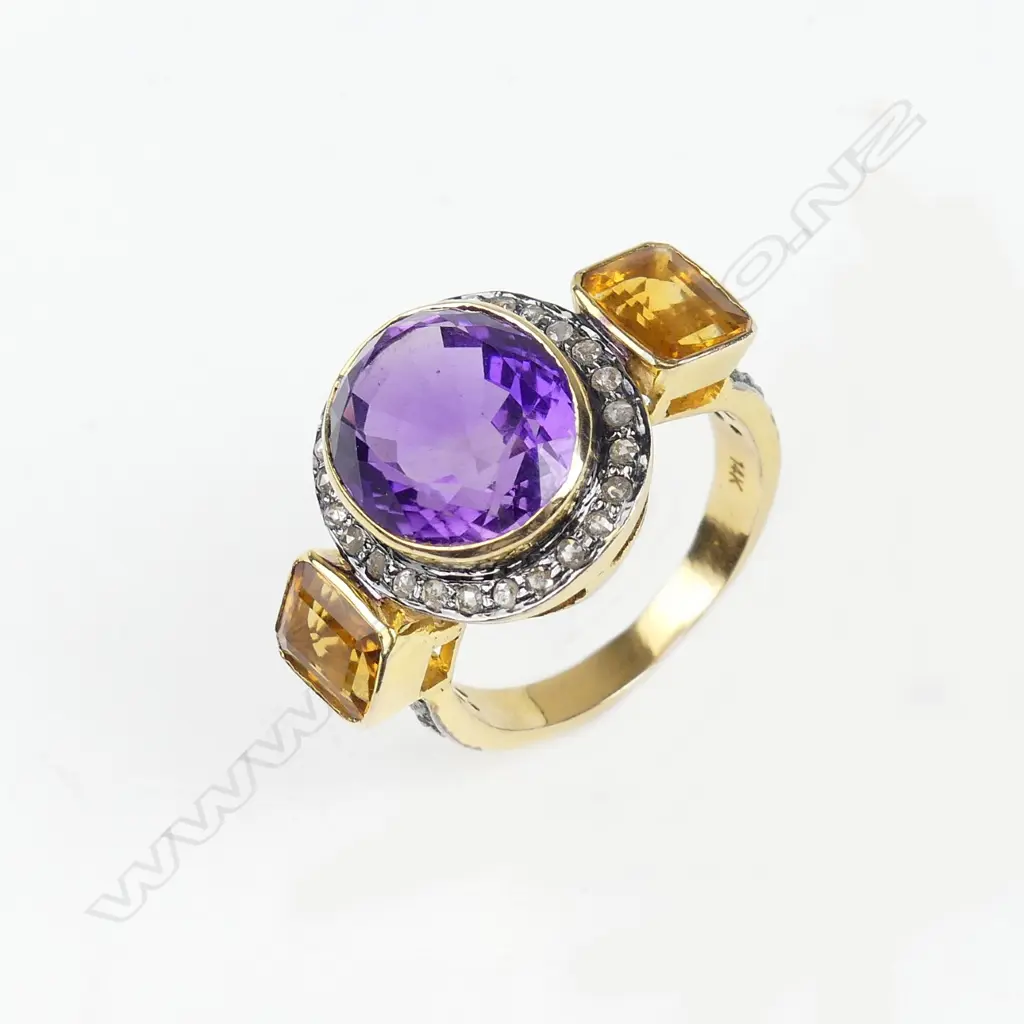 A 14ct gold amethyst diamond and citrine dress ring Image 1++