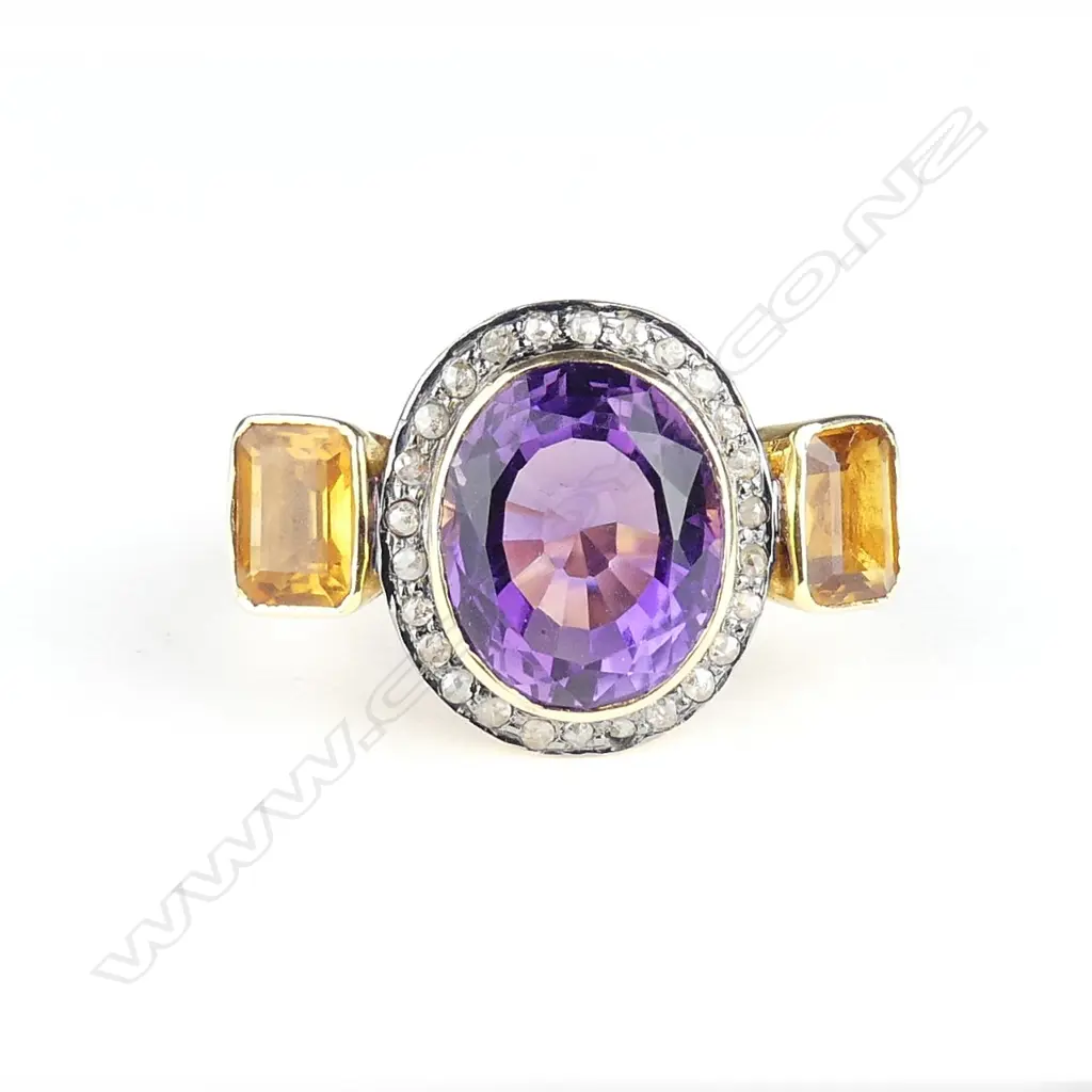 A 14ct gold amethyst diamond and citrine dress ring Image 1++