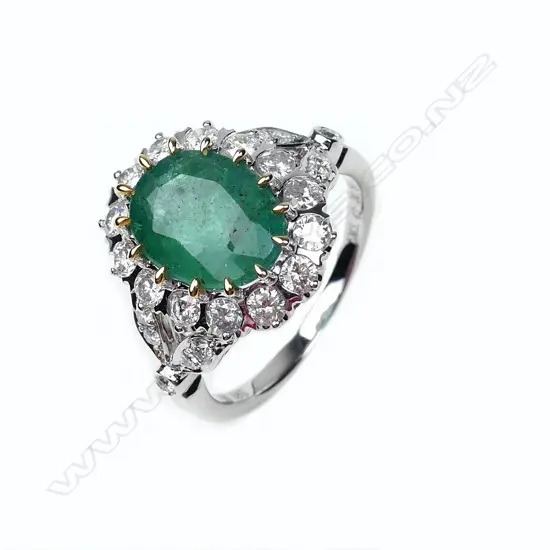 A 14ct gold emerald and diamond ring
