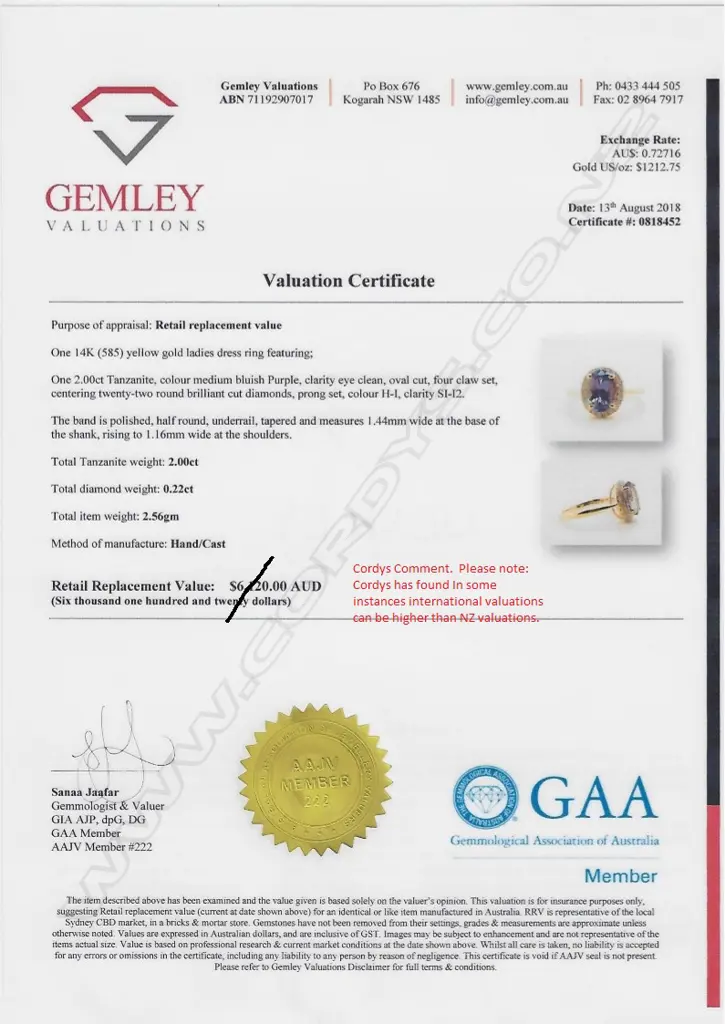 A 14ct gold tanzanite and diamond ring Image 1++