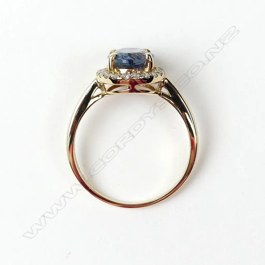 A 14ct gold tanzanite and diamond ring Image 1++