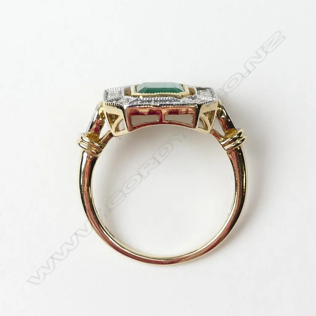 A 9ct gold emerald and diamond ring Image 1++