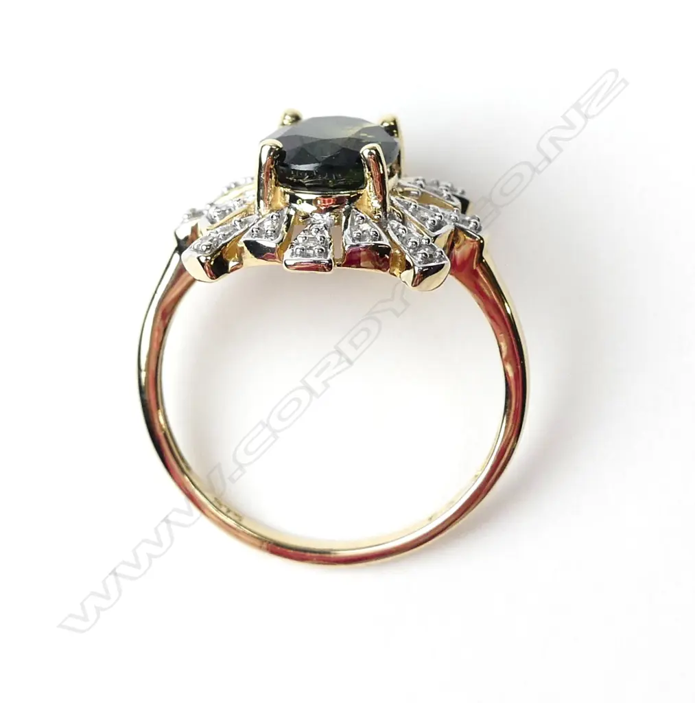 A 9ct gold tanzanite and diamond ring Image 1++