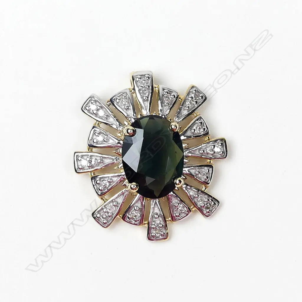 A 9ct gold tanzanite and diamond pendant Image 1++