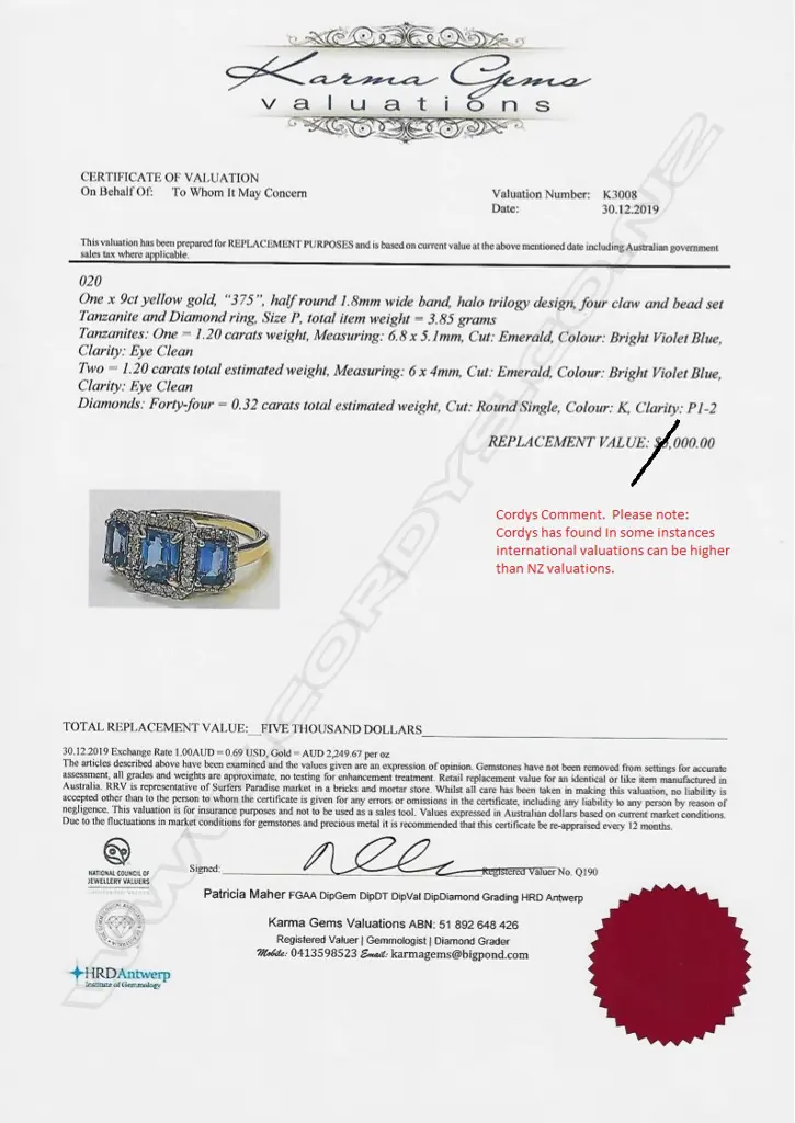 A 9ct gold tanzanite and diamond trilogy ring Image 1++