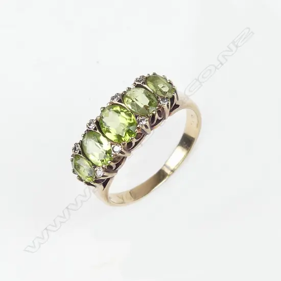 A 9ct gold peridot and diamond ring