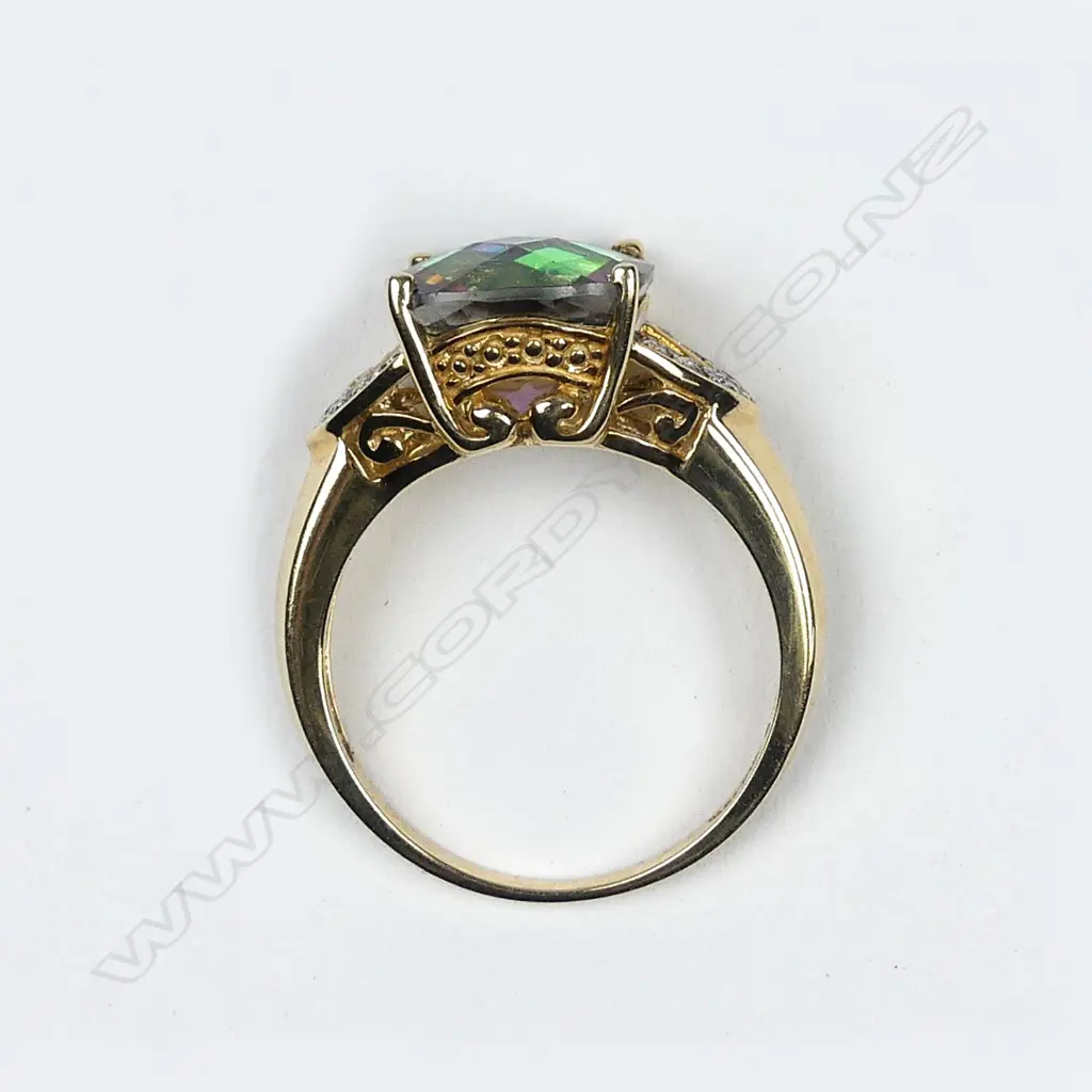 A 10ct gold diamond and mystic topaz dress ring Image 1++