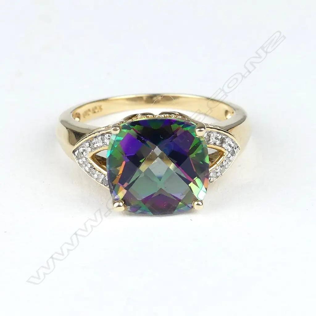 A 10ct gold diamond and mystic topaz dress ring Image 1++