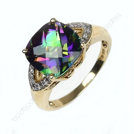 A 10ct gold diamond and mystic topaz dress ring