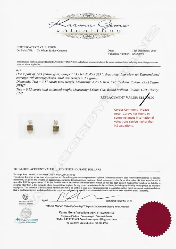 A pair of 14ct gold and diamond stud earrings Image 1++