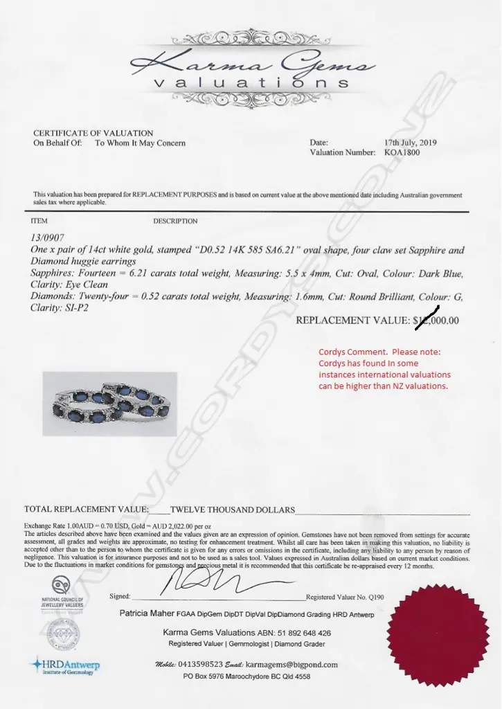 A pair of 14ct white gold sapphire and diamond hoop earrings Image 1++