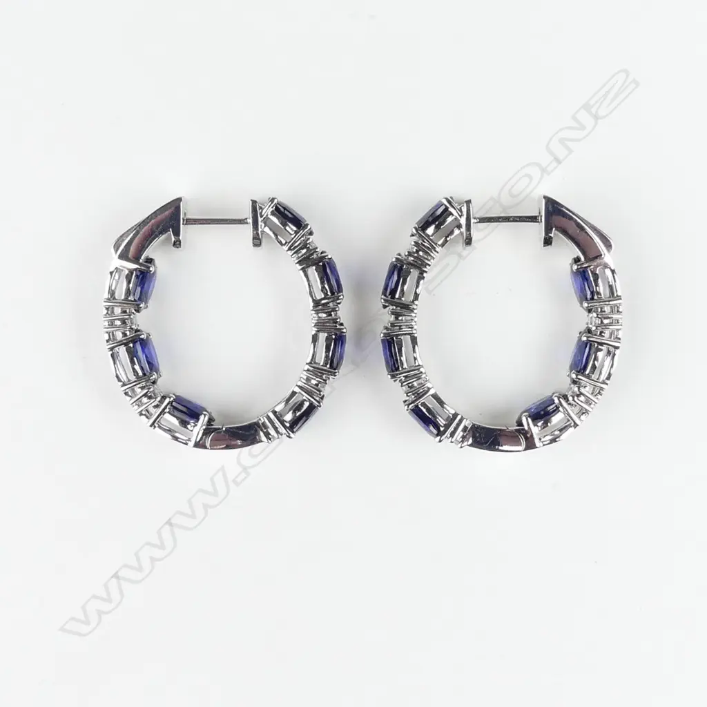 A pair of 14ct white gold sapphire and diamond hoop earrings Image 1++