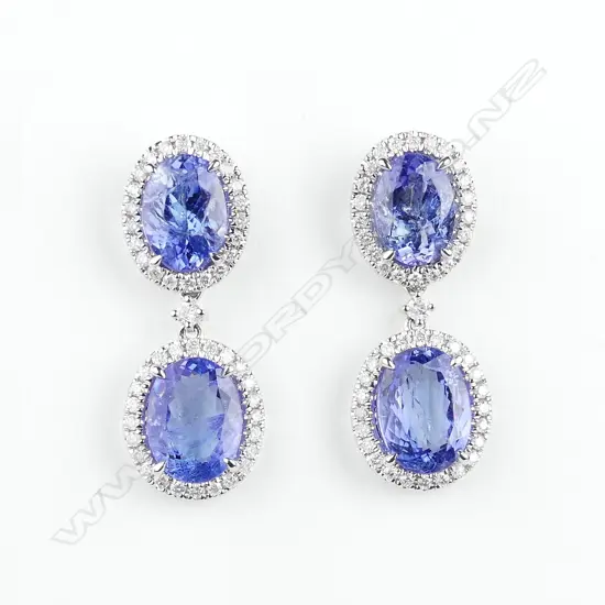 A pair of 14ct white gold tanzanite and diamond drop earrings