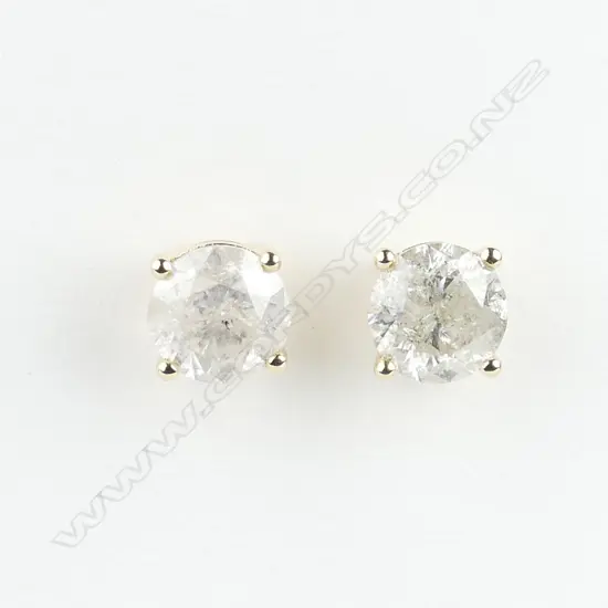 A pair of 14ct gold and diamond stud earrings