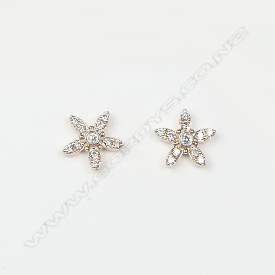 A pair of 18ct rose gold diamond stud earrings