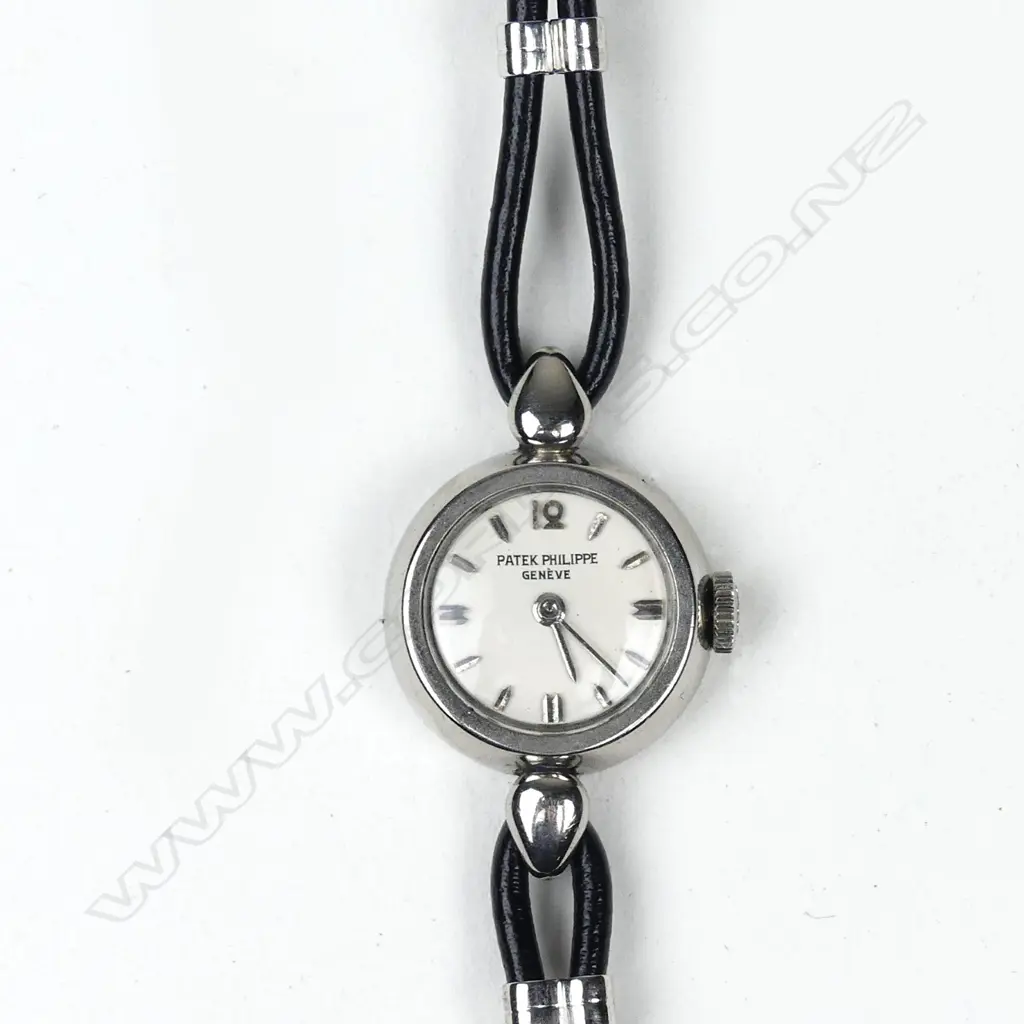 A Patek Philippe lady's vintage platinum wristwatch Image 1++