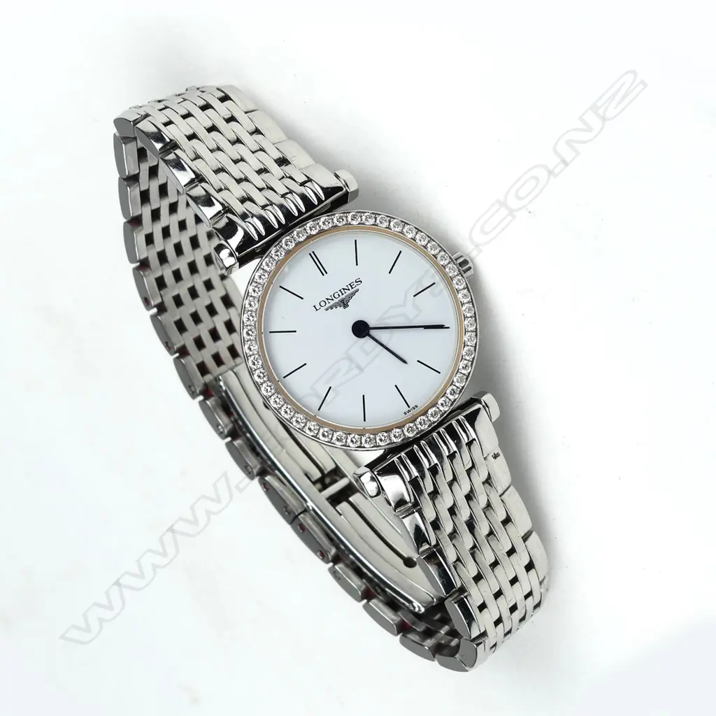 A lady's Longines stainless steel and diamond wristwatch Image 1++