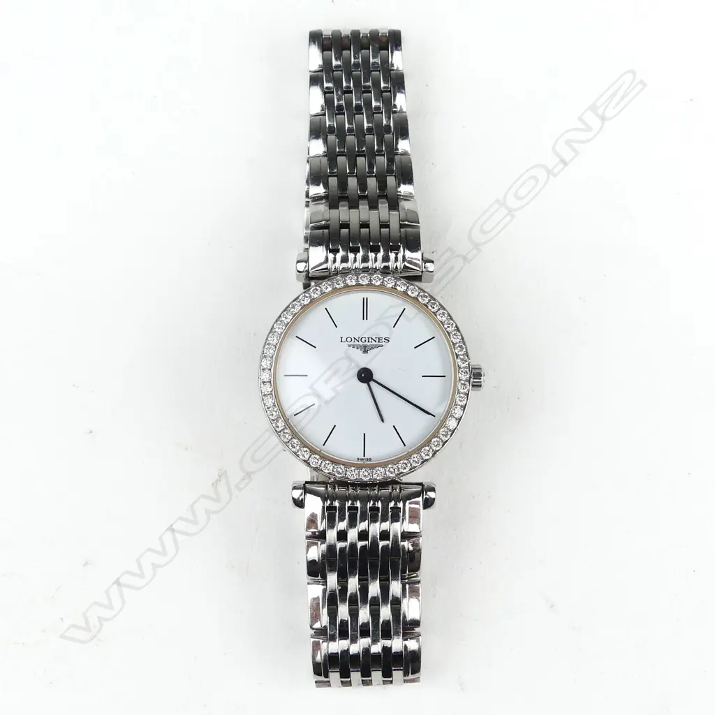 A lady's Longines stainless steel and diamond wristwatch Image 1++