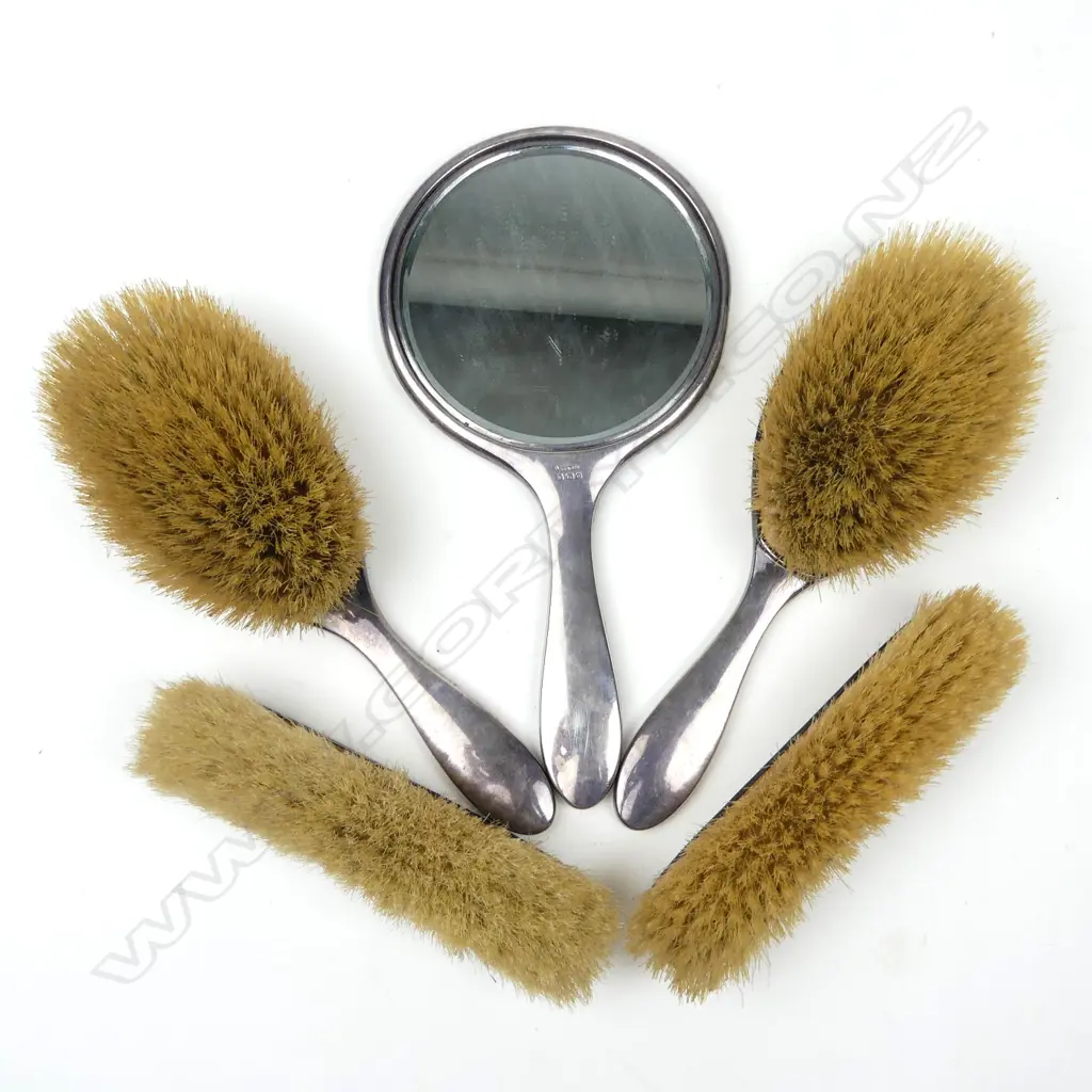 A silver and tortoiseshell pique work dressing table set Image 1++