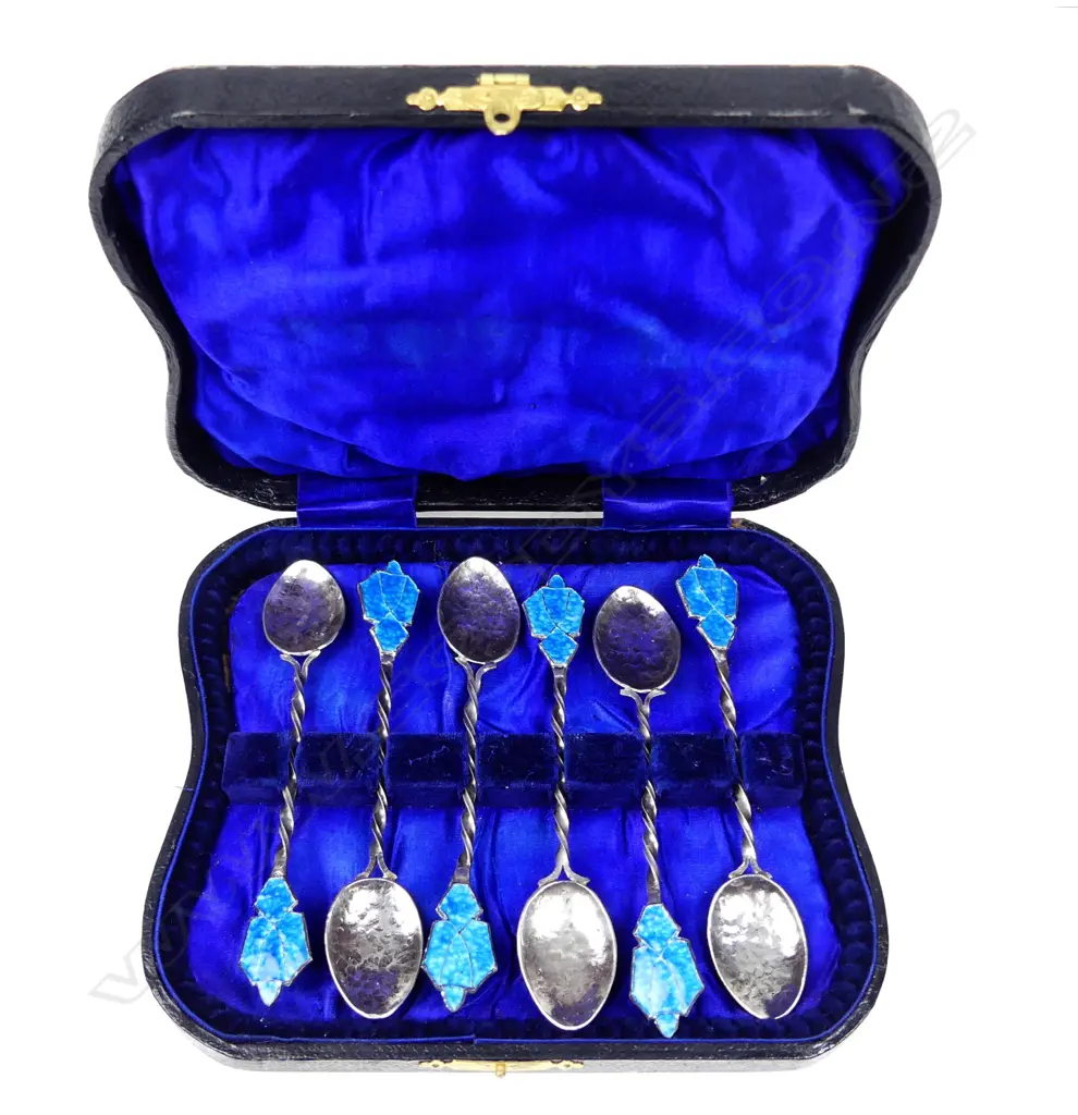An uncommon set of six Reuben Watts Arts & Crafts silver and enamel coffee spoons Image 1++