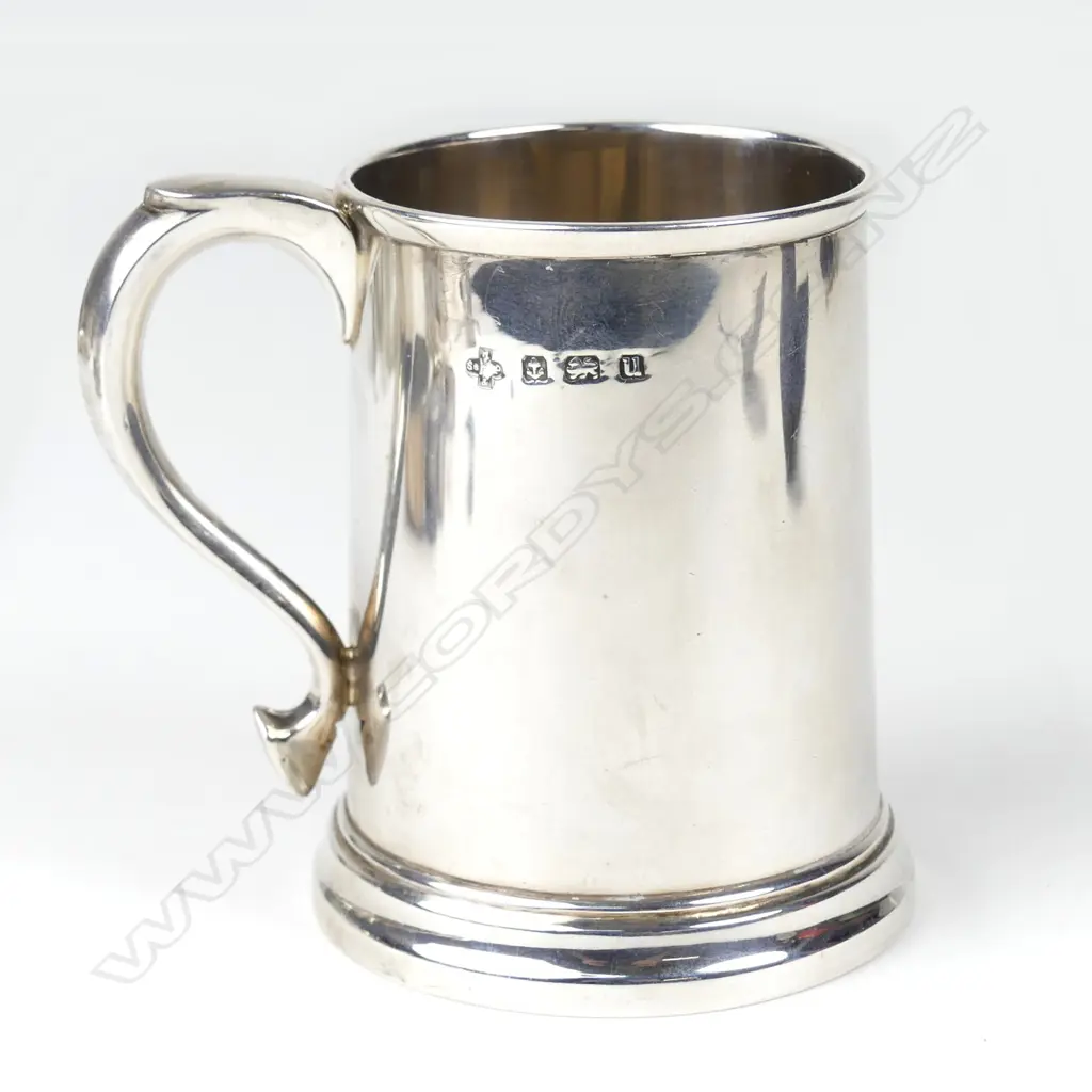 A silver 7oz mug Image 1++