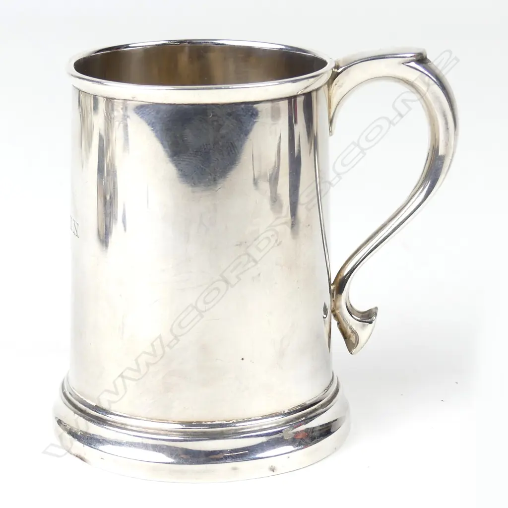 A silver 7oz mug Image 1++
