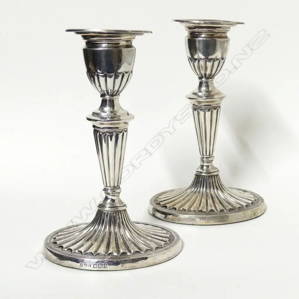 A pair Victorian silver candlesticks Image 1++