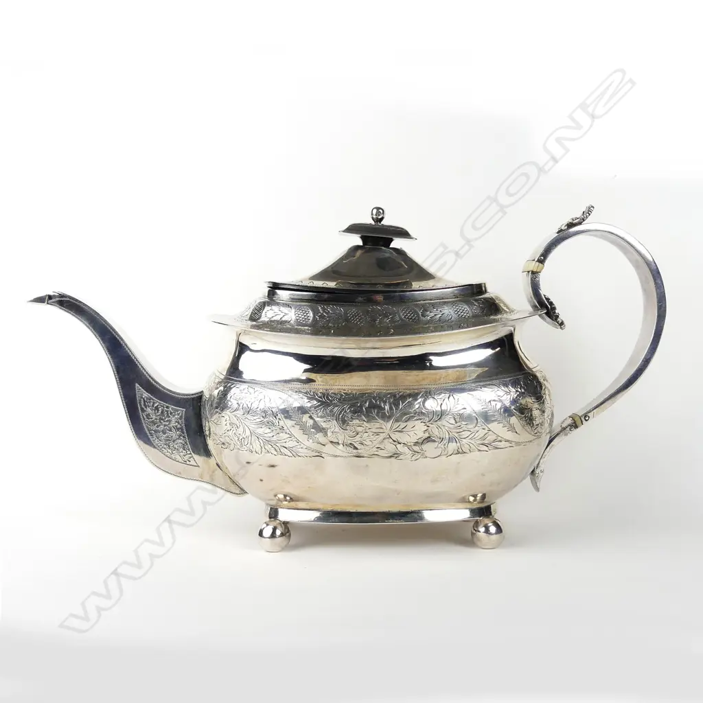 A George III silver teapot Image 1++