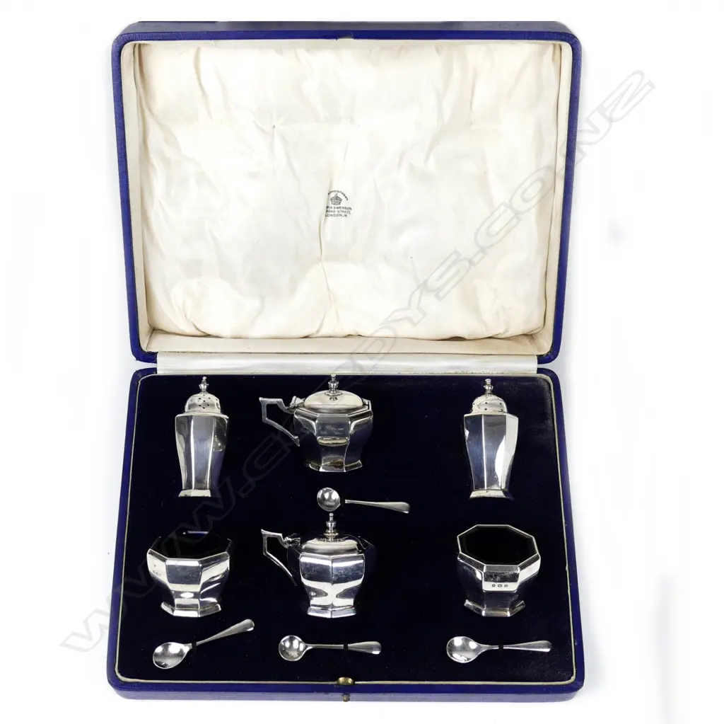 A silver condiment set Image 1++