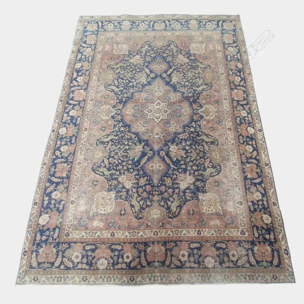 An antique Tabriz carpet Image 1++