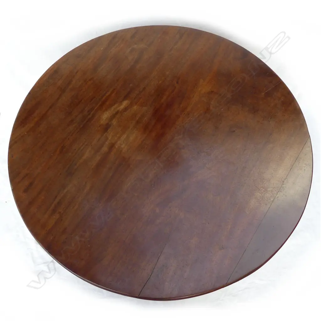 A George III mahogany tripod table Image 1++
