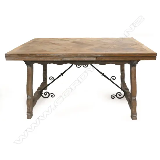 A French parquetry lime-washed oak dining table