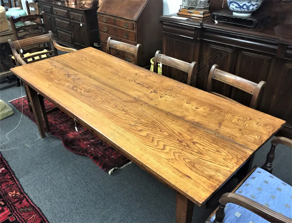 A late 19thC elm country dining table Image 1++
