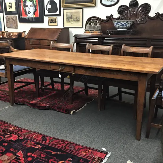 A late 19thC elm country dining table
