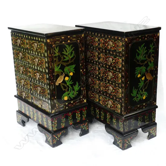 A pair of 20thC Oriental ornately decorated lacquered small multi-drawer chests