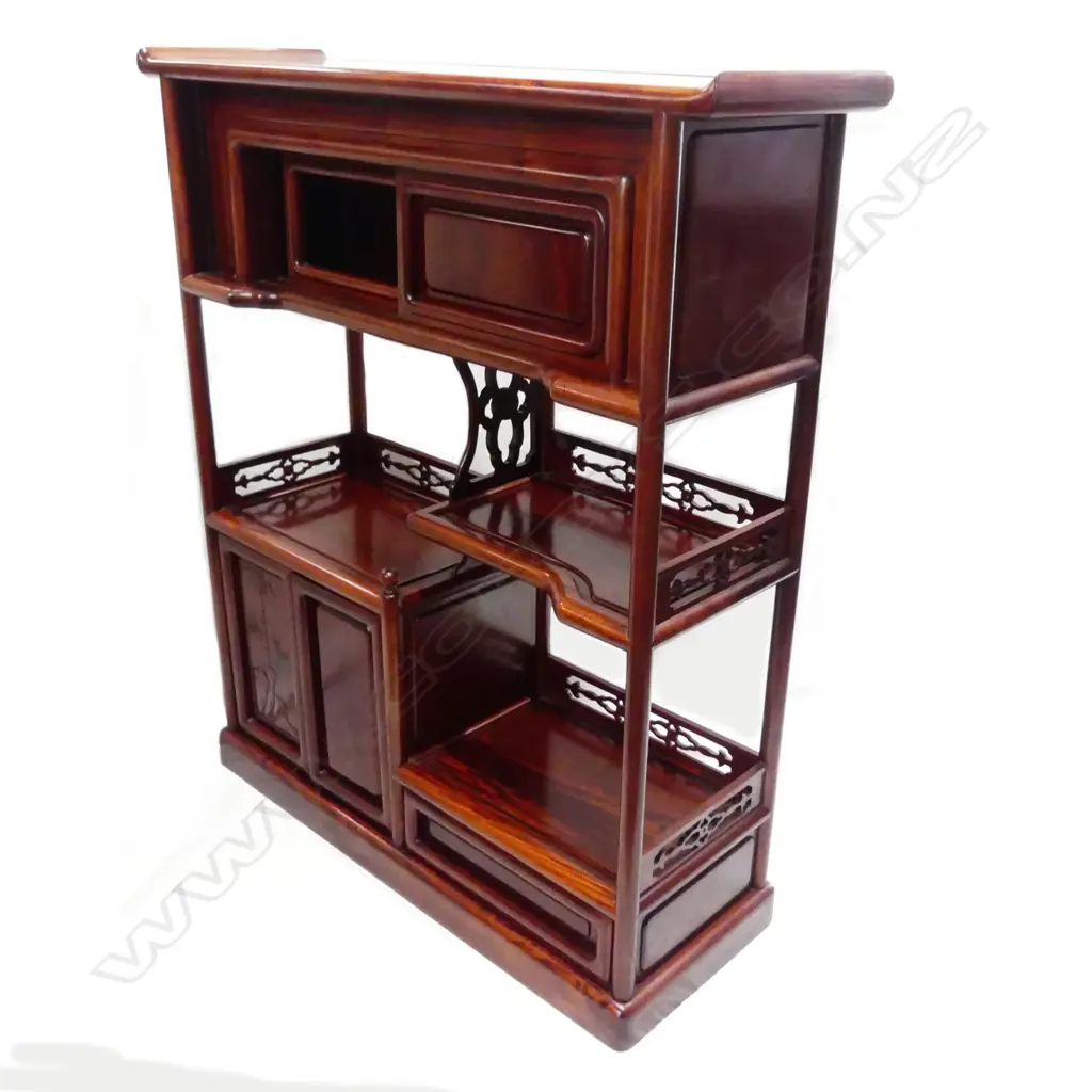 A mid/late 20thC Oriental zitan wood display cabinet of small proportions Image 1++