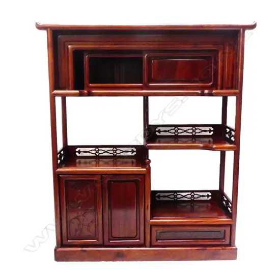 A mid/late 20thC Oriental zitan wood display cabinet of small proportions