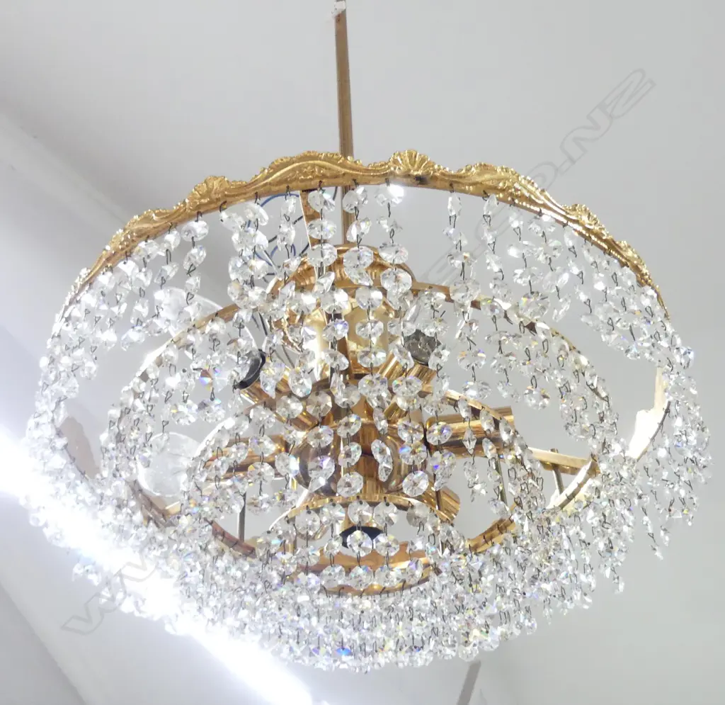 A retro crystal and gilt brass chandelier Image 1++