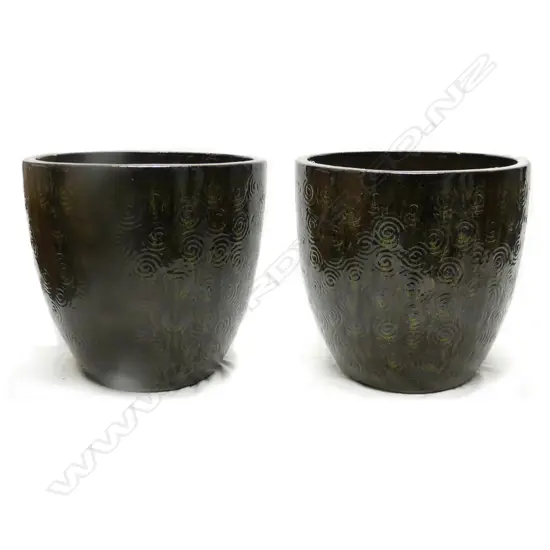 A pair of large mottled green glazed garden pots