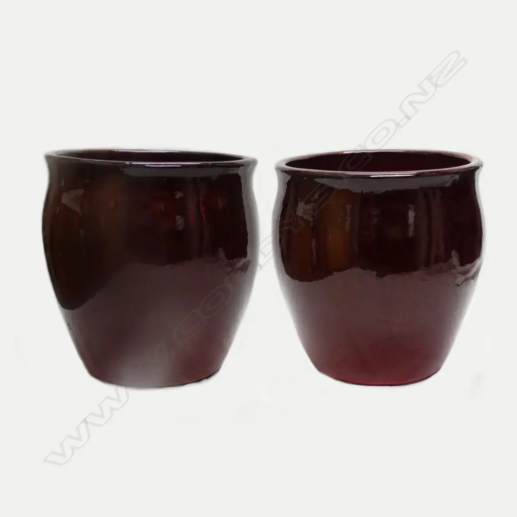 A pair of large flambé red glazed urns Image 1++