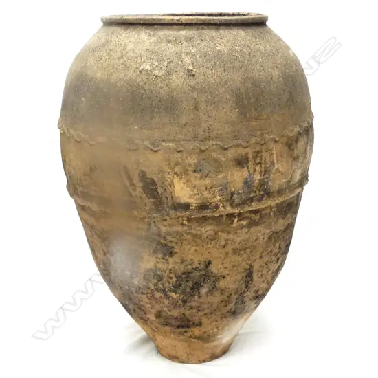 An old Turkish terracotta tall storage jar