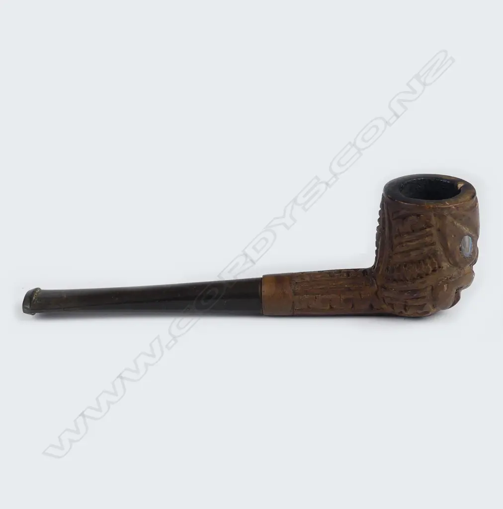A vintage Maori carved pipe Image 1++