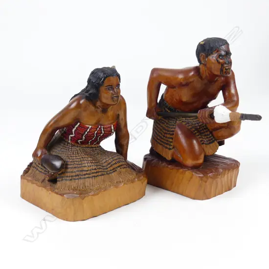 A pair of vintage Maori carved figures